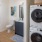 a bathroom with a laundry area